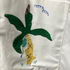 Vintage 1960’s open front shirt from Jamaica colorful embroidery.